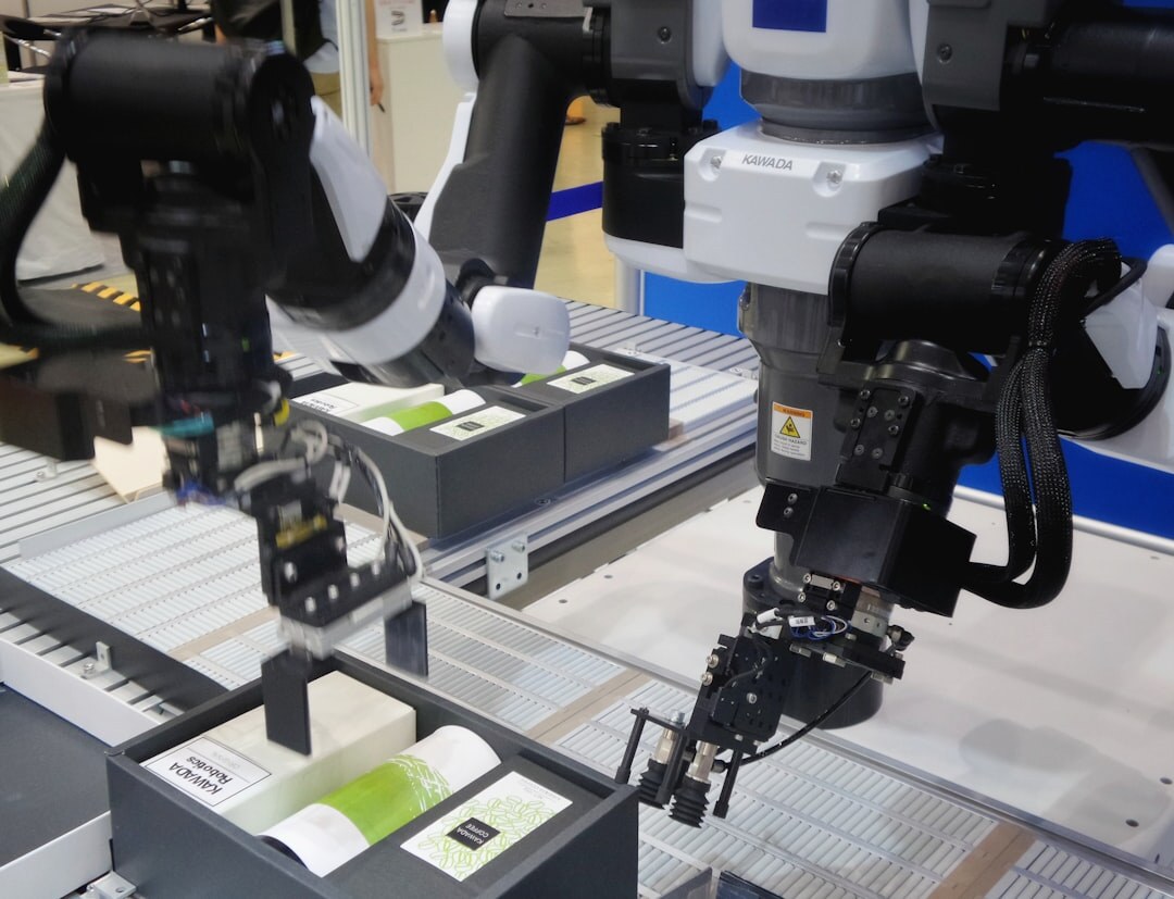 Industrial robot arm in factory