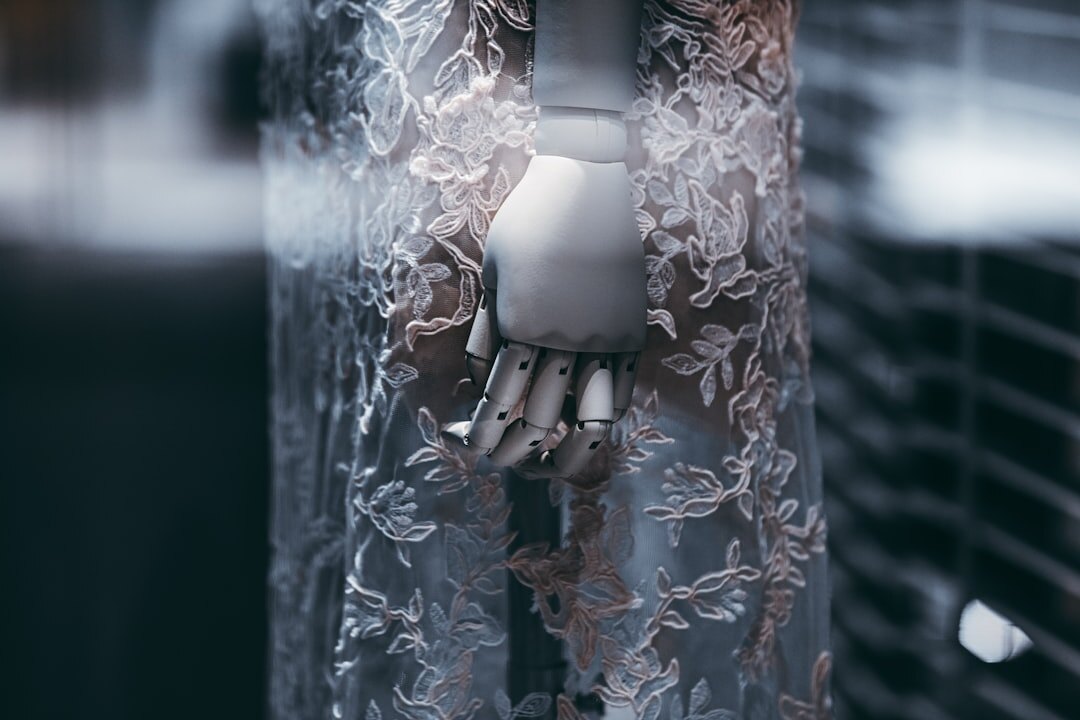 AI robot hand reaching out to human hand
